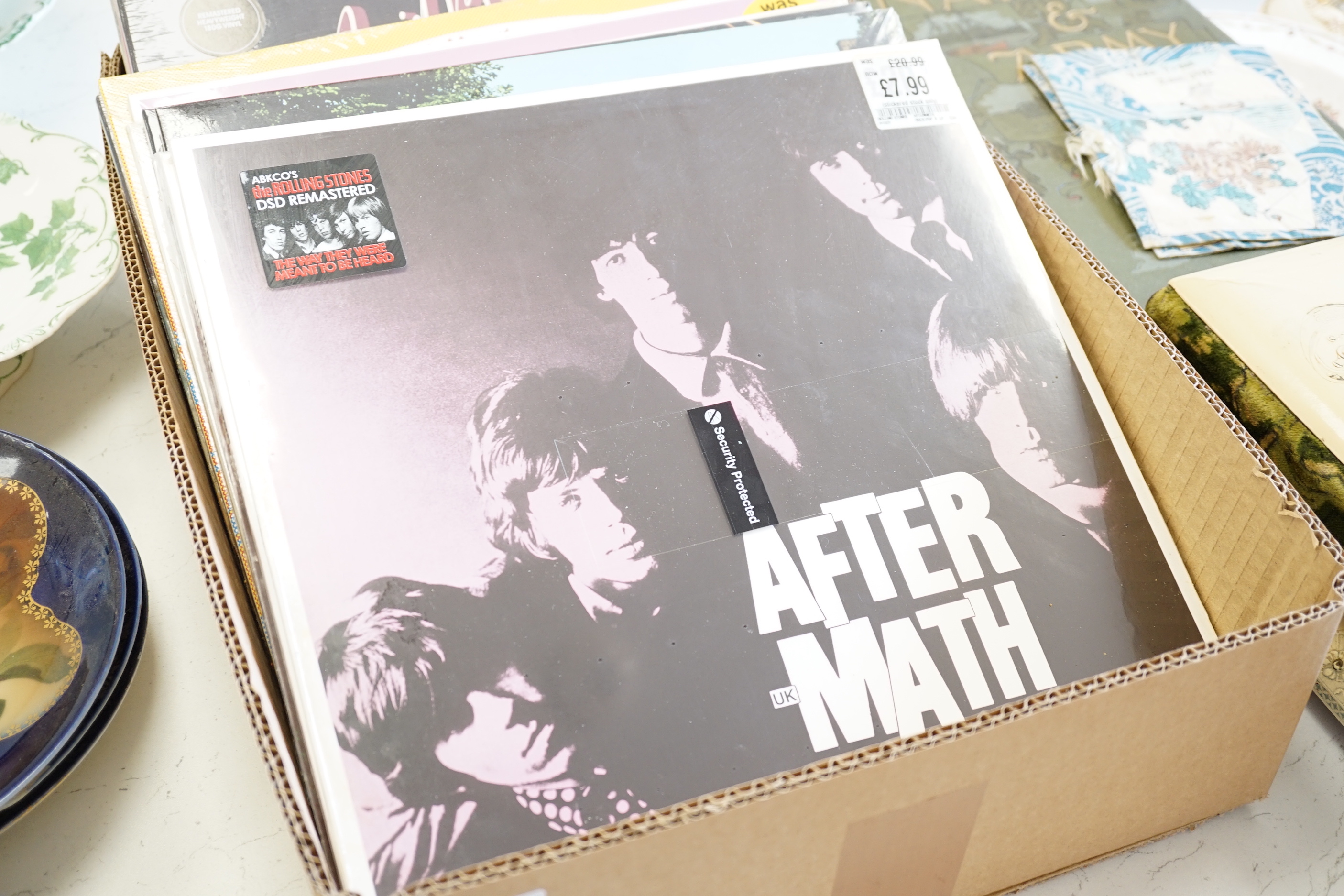Nineteen sealed album re pressings, 1960’s & 1970’s rock to include The Beatles, David Bowie, Rolling Stones etc.